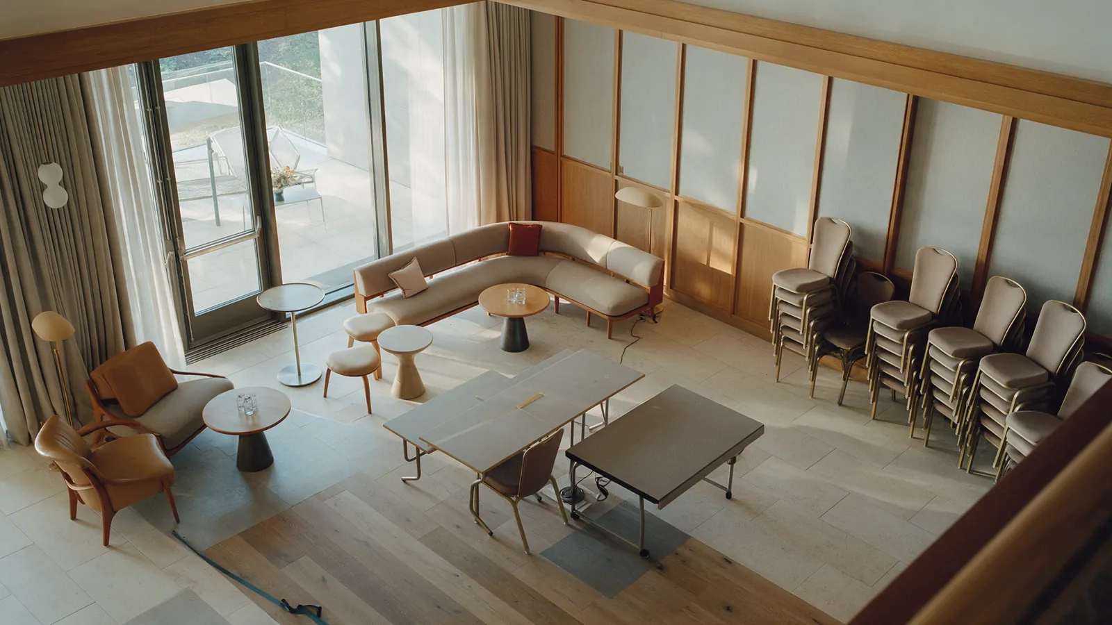 Illustrative hotel meeting lounge temporarily being reset and unavailable.