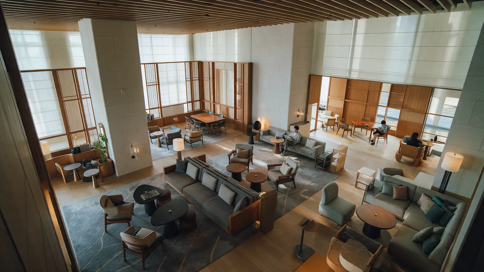 Illustrative hotel lounge showing its seating layout and open walking space.
